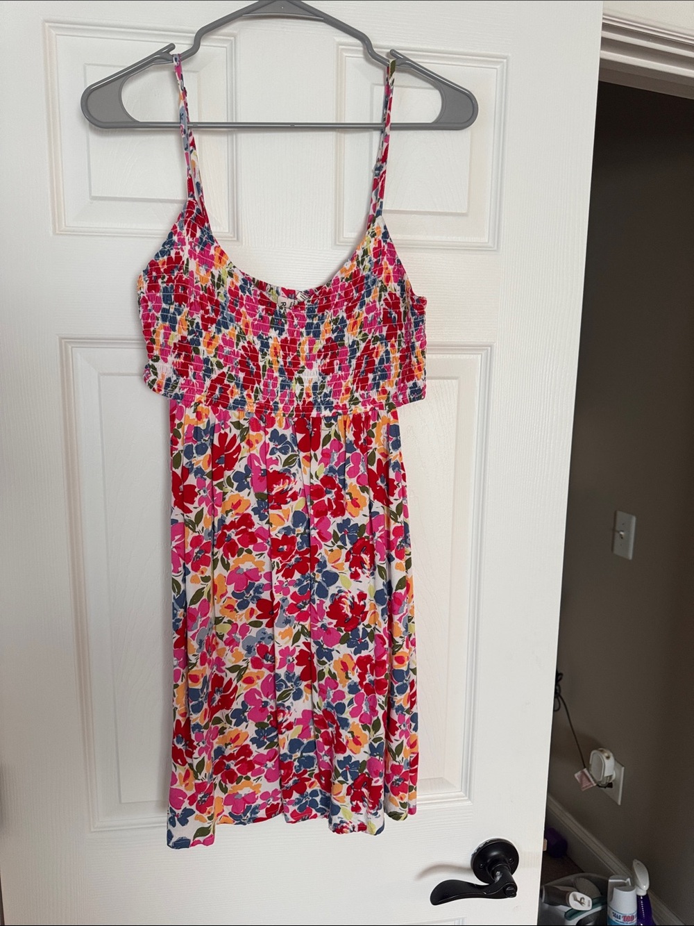 Roxy Floral Smocked Sundress in Pink & Red. Cut-out on sides.